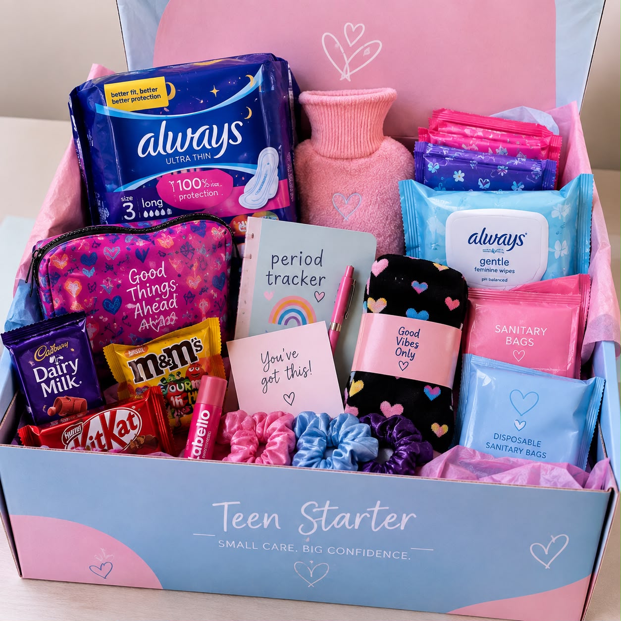 Teen Starter Pack with pads, a hot water bottle, tracker notebook and scrunchies